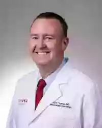 Dr. Christopher Thomas Dr. Christopher Thomas